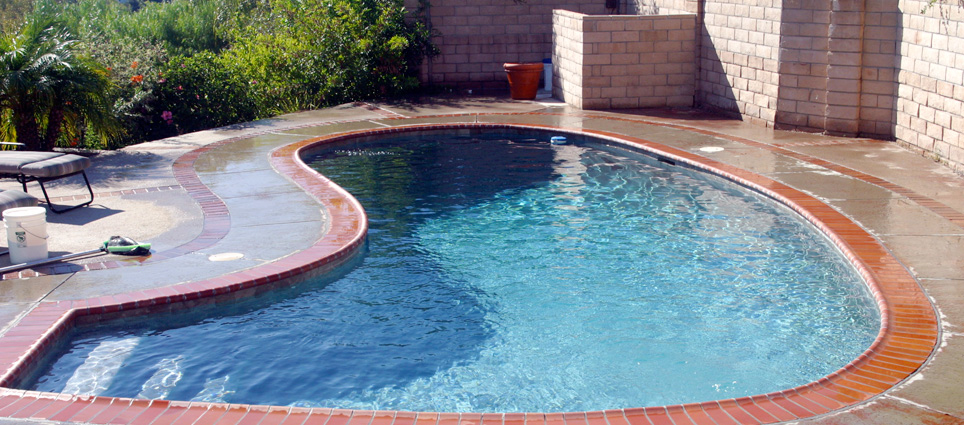 Finished black plaster pool after stains removed