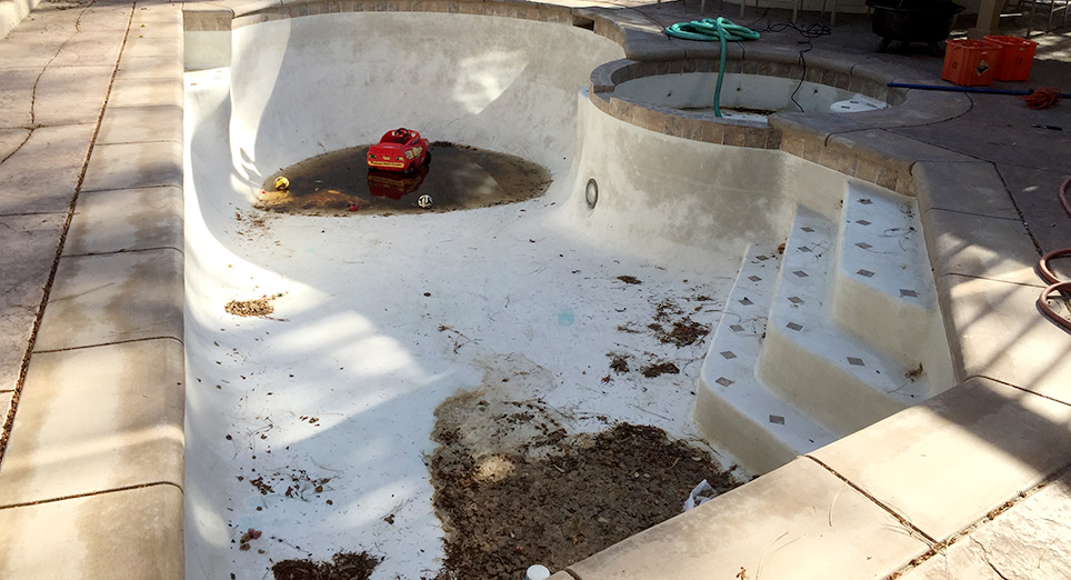 Brown pool with light stains