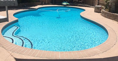 Painted blue pool after an acid wash