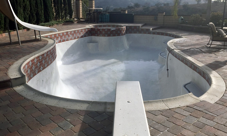 Pool with algae after chlorine wash