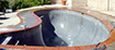 Black plaster pool with stains removed